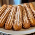 Churros maison croustillants saupoudrés de sucre